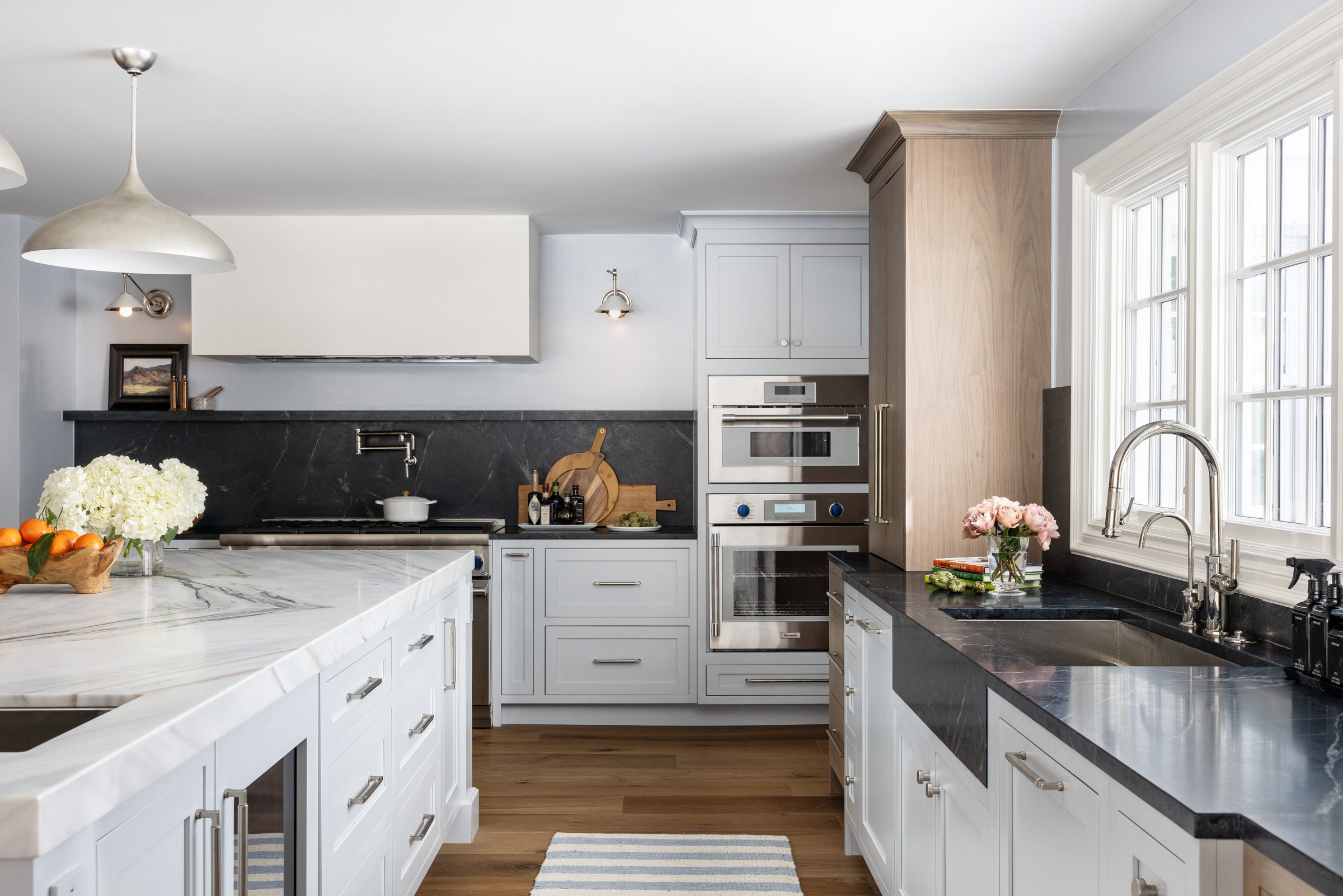 Custom kitchen with a marble island, built by Mosher Dolan