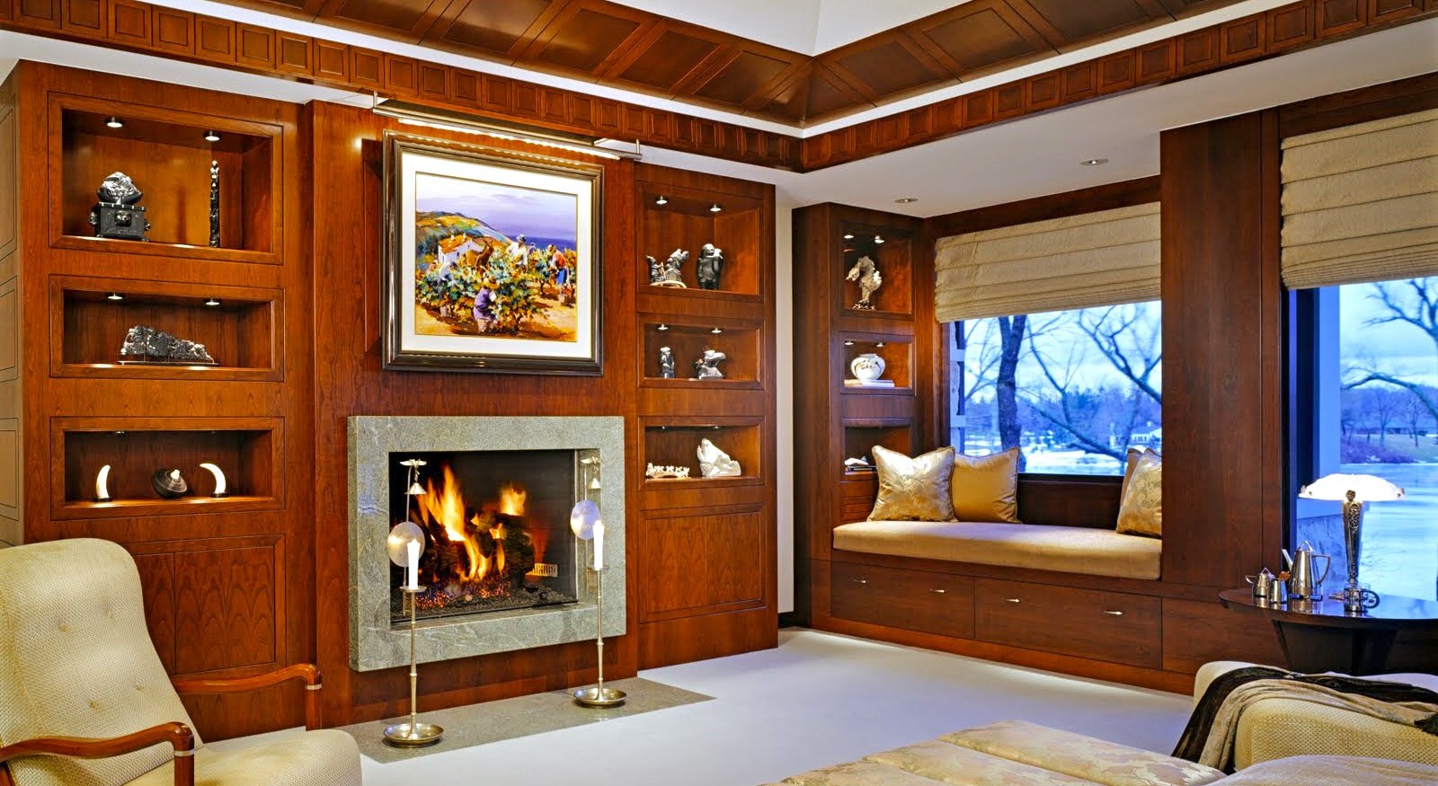 The bedroom fireplace and window seat, in cherry
