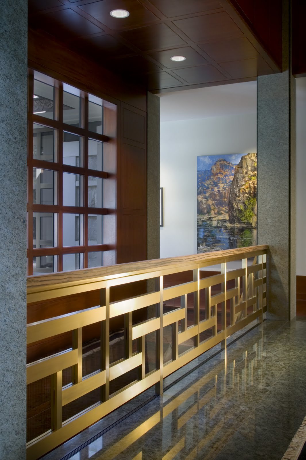 The bronze handrail, designed and made by a local artist, with the dining room beyond
