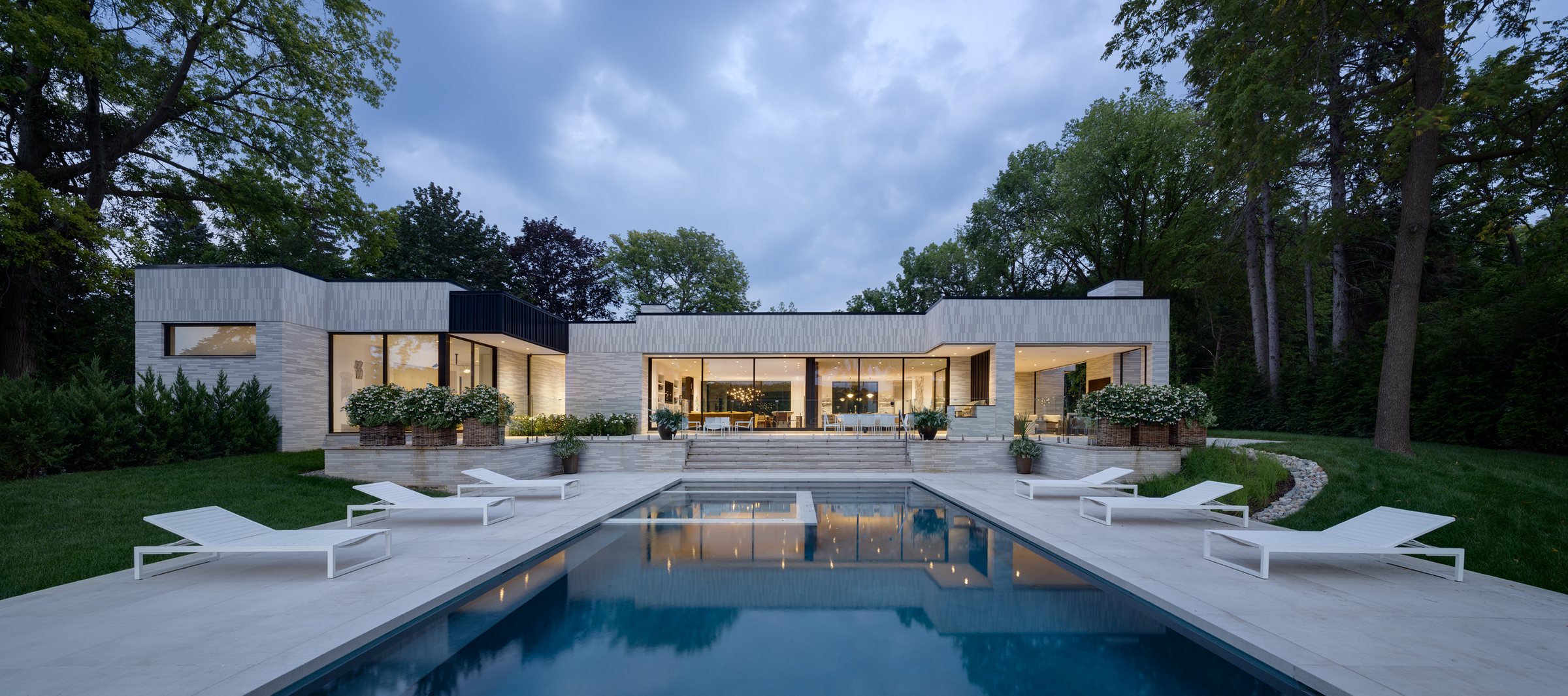 Pool and lounge terrace looking back at the house