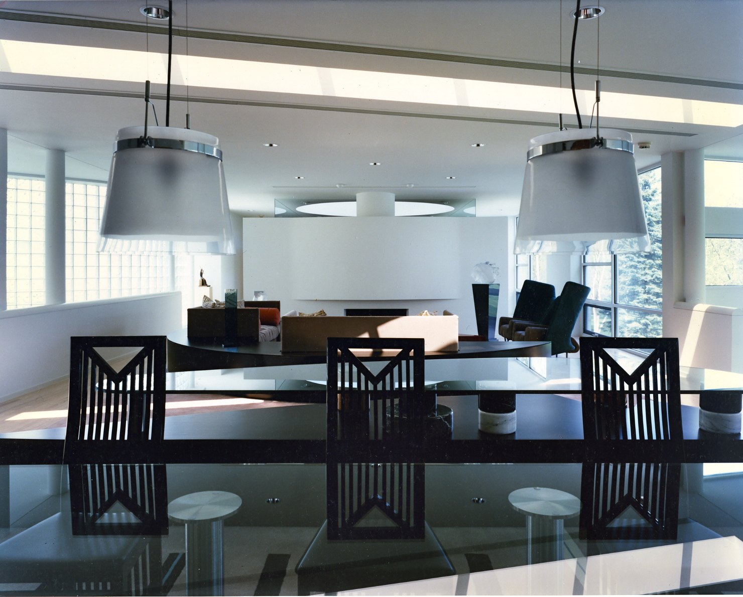 The dining table, looking back to the living room and its oval skylight
