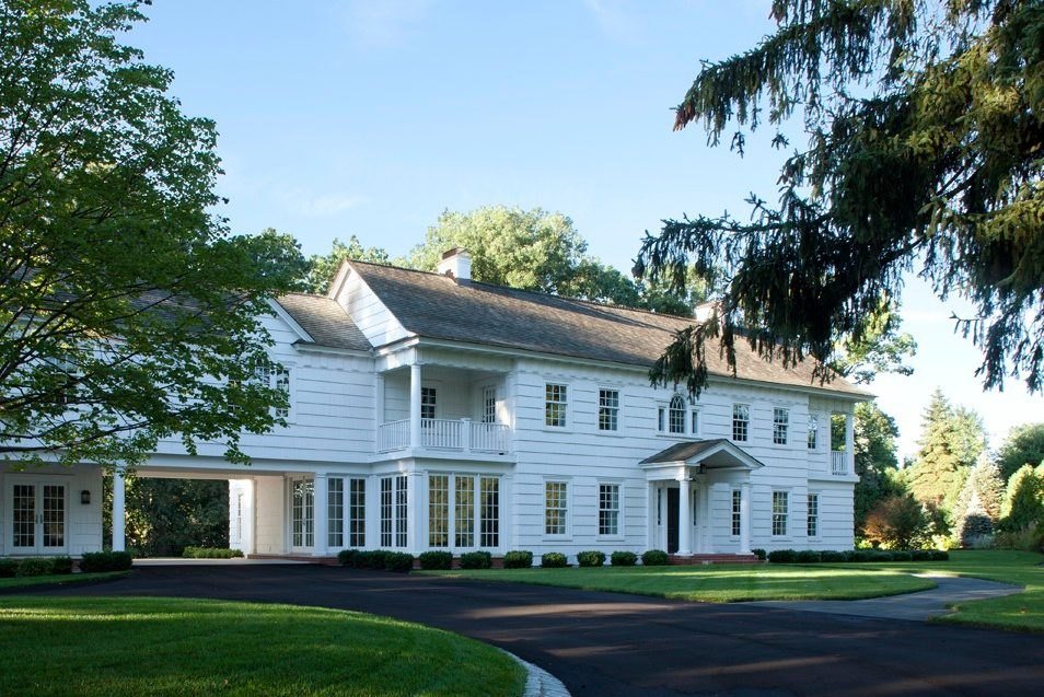 Archive 034: a white clapboard colonial with a deep porch