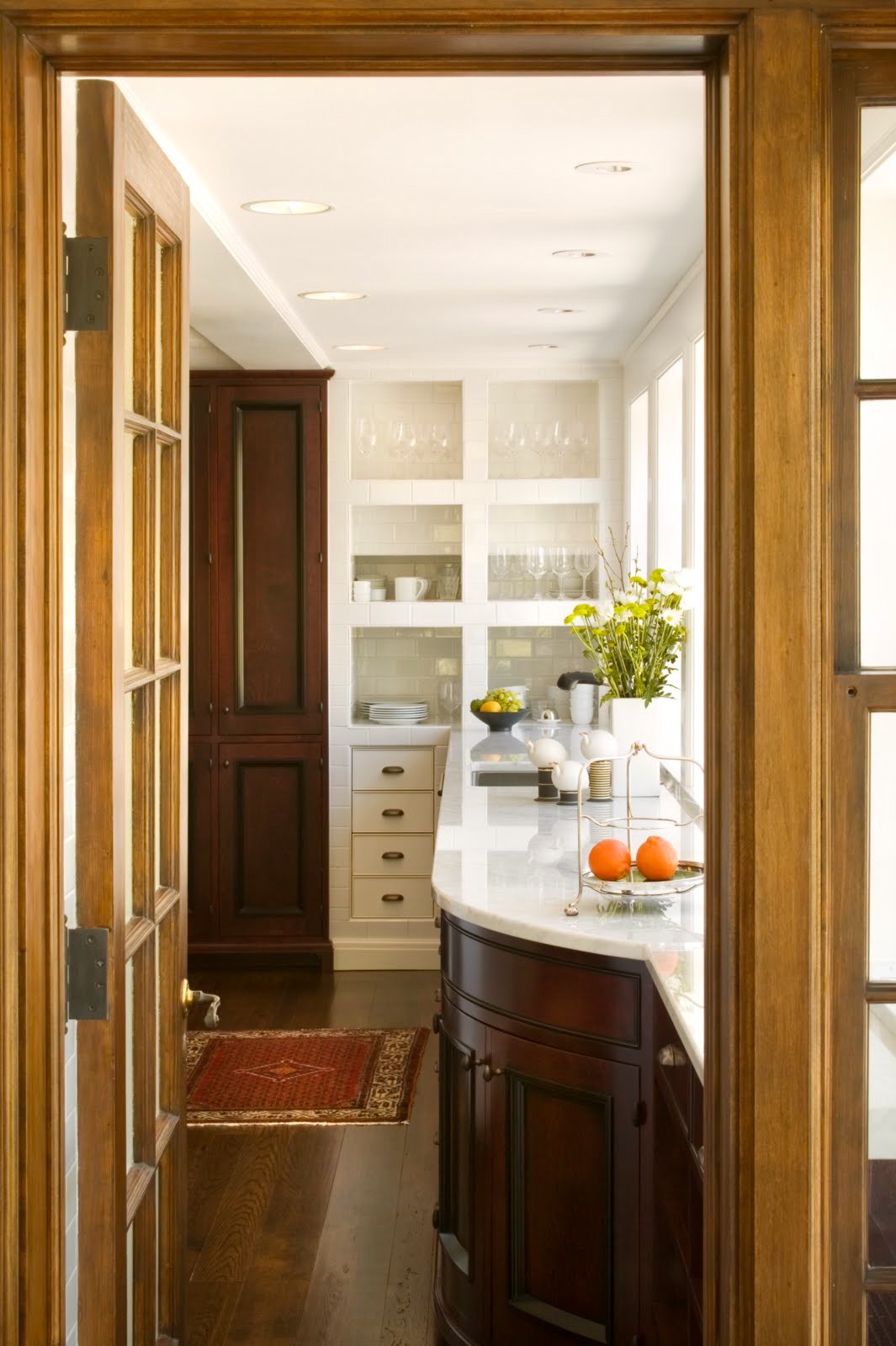The butler&rsquo;s pantry, remade with marble counters and glazed tile