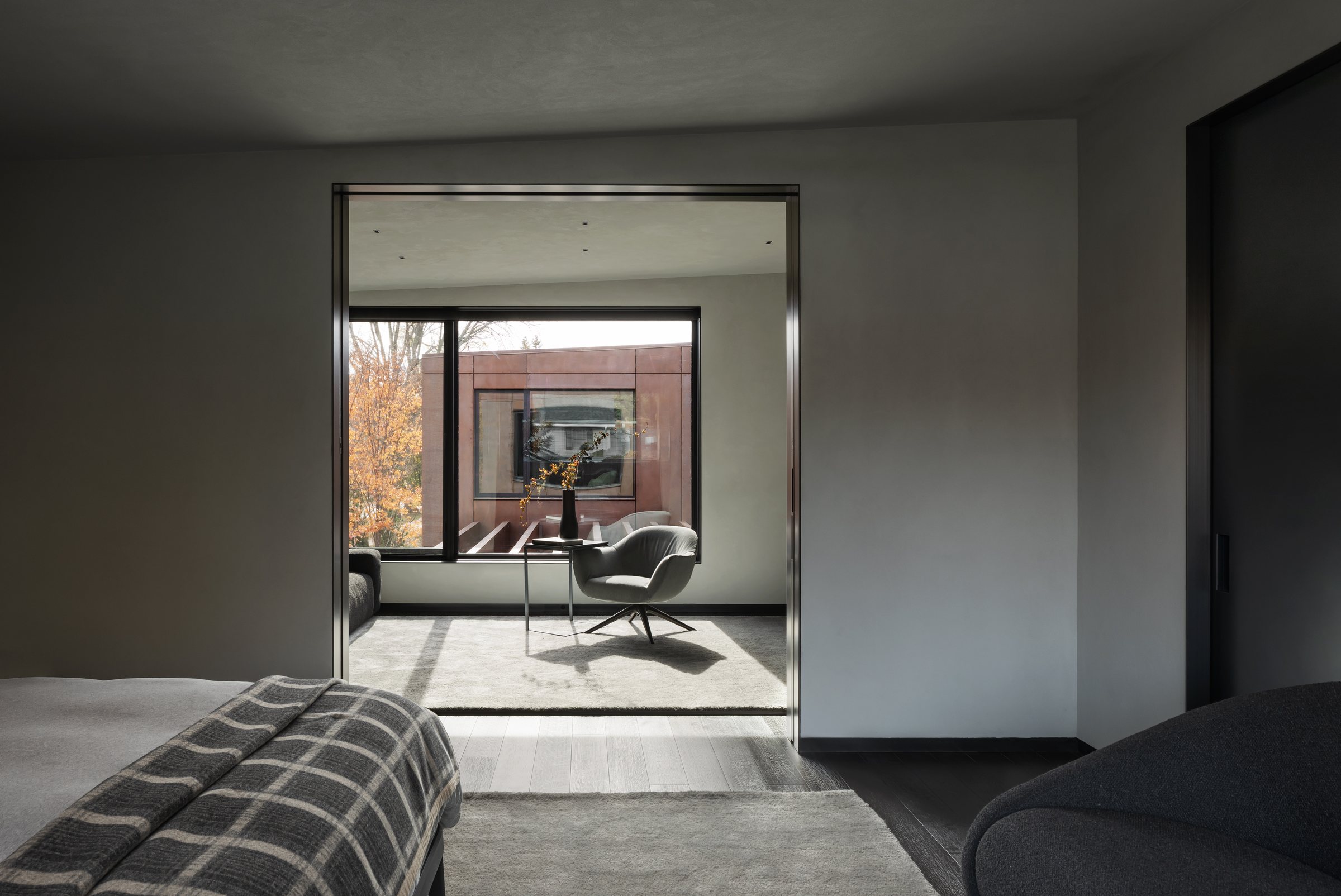 Primary bedroom with a fireplace, built by Mosher Dolan