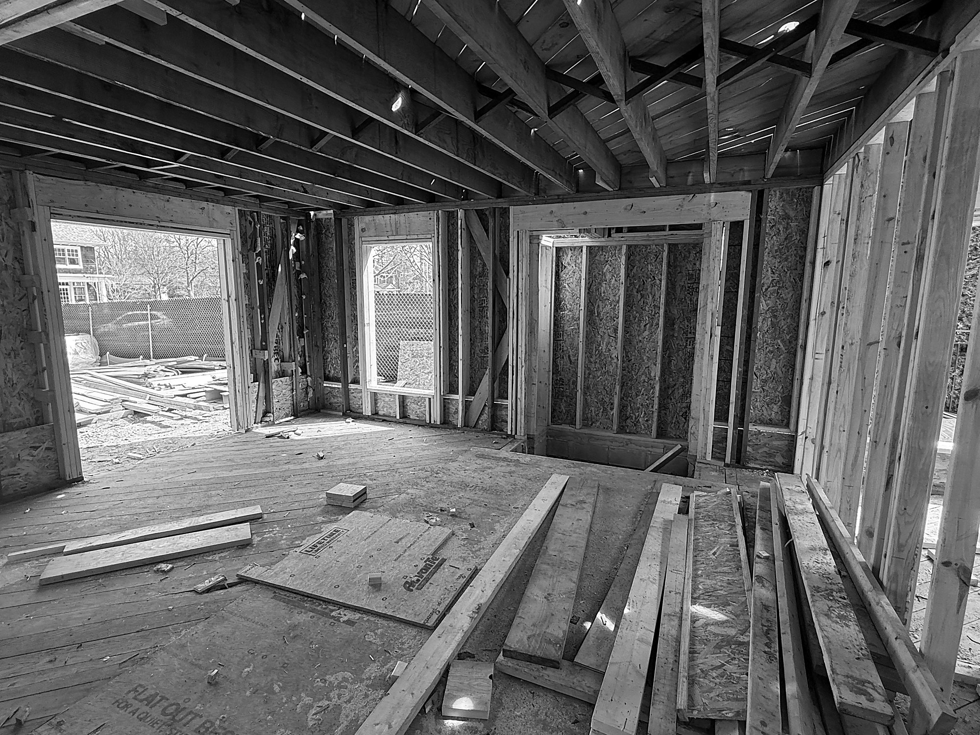 Window and door openings in a framed house. Each rough opening is a break in the air barrier that has to be connected to the window when it goes in.