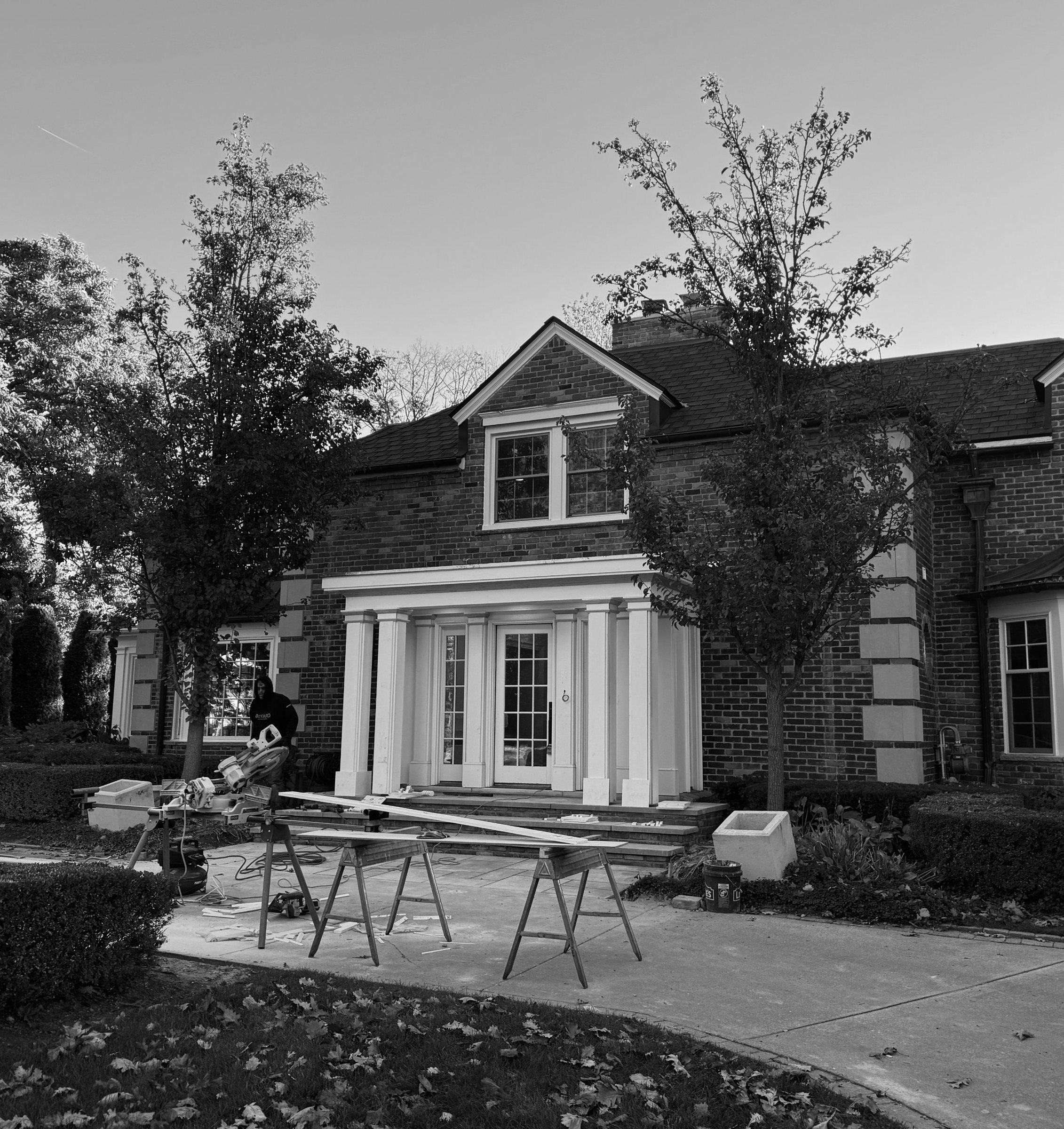Trim being cut on site. Profiles were matched to original millwork on the house.