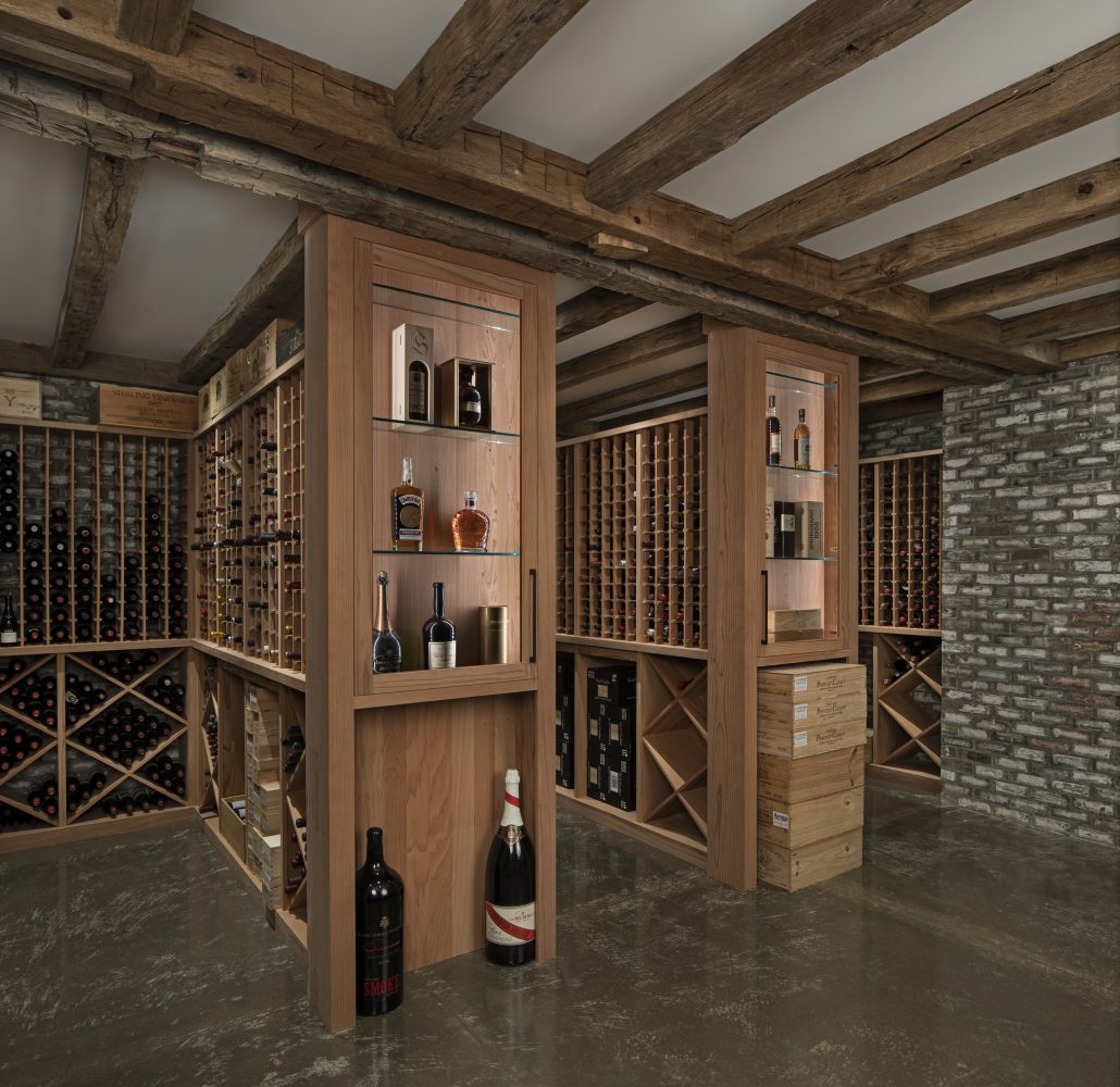 Wine room with reclaimed beams and brick